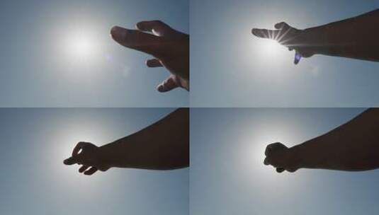 手触摸太阳祈求希望加油打气明天更好高清在线视频素材下载