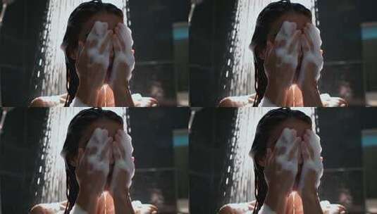 女人浴室淋浴洗脸高清在线视频素材下载