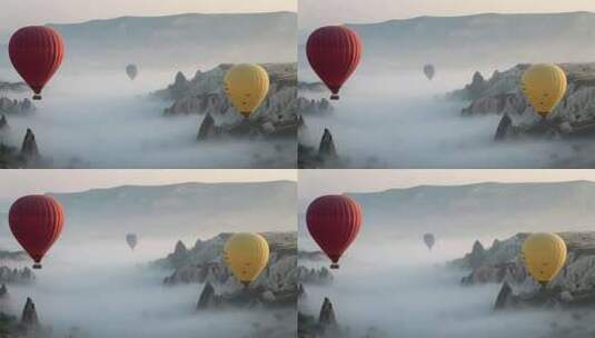 山谷间热气球飞行场景高清在线视频素材下载