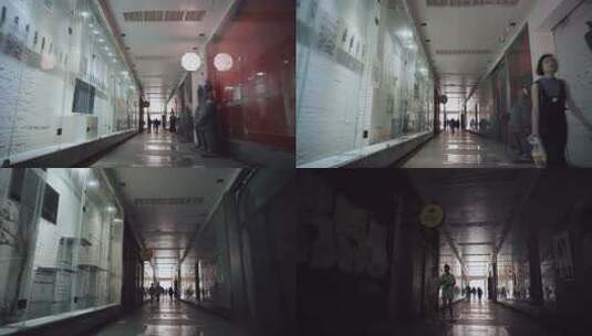 走廊尽头的光影与行人高清在线视频素材下载