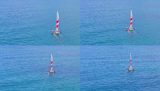 海南三亚海棠湾后海渔村航拍蔚蓝色海岸线高清在线视频素材下载