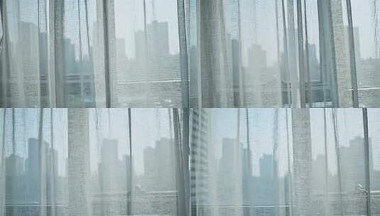 透过窗帘看城市高楼景观高清在线视频素材下载