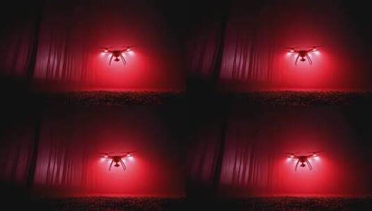 迷雾森林深处红光无人机夜间巡航高清在线视频素材下载