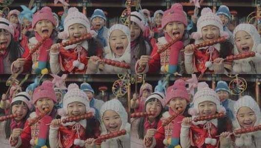 拿着糖葫芦面对着镜头微笑的女孩高清在线视频素材下载