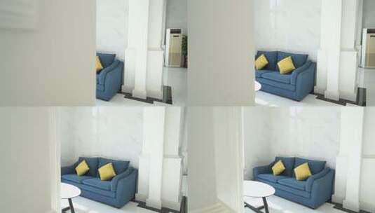 室内蓝色沙发配黄色抱枕高清在线视频素材下载