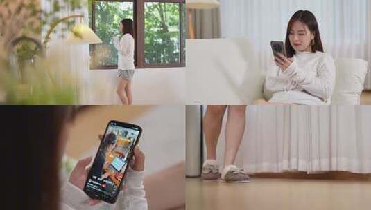 女子沙发上专注看手机高清在线视频素材下载