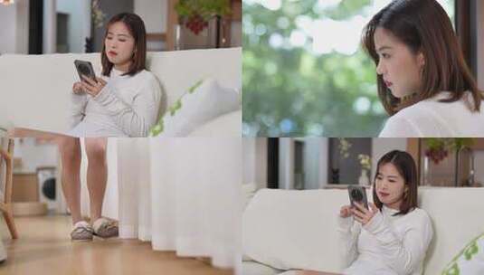 女子沙发休闲刷视频看窗外思考高清在线视频素材下载