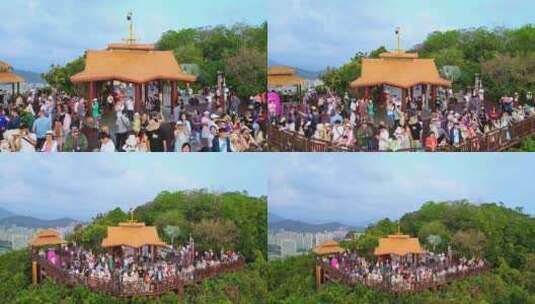 海南三亚鹿回头公园市民游客观赏日落人流高清在线视频素材下载