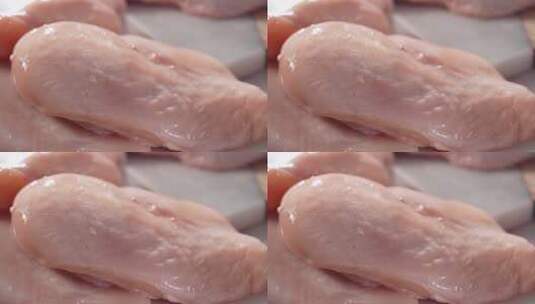 在明亮厨房的鸡胸肉特写高清在线视频素材下载