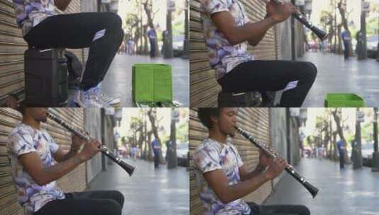 好莱坞街头艺人的单簧管表演高清在线视频素材下载