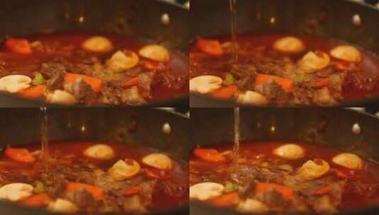 炒制香辣底料炖牛肉高清在线视频素材下载