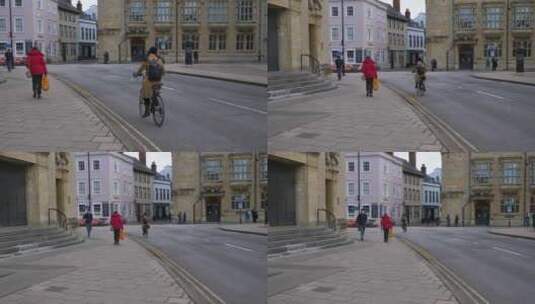 跟踪拍摄街道上骑自行车的人高清在线视频素材下载