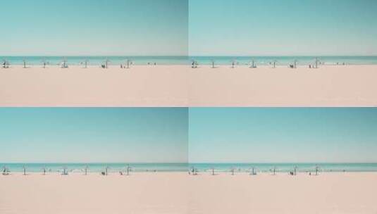 8k实拍海边沙滩上的游客唯美空镜高清在线视频素材下载