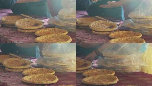 新疆美食特色小吃销售馕饼现场高清在线视频素材下载