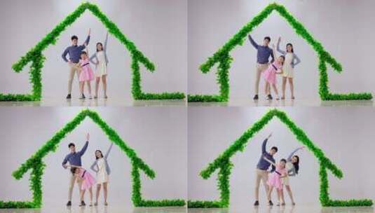 绿色房子下锻炼身体的一家人高清在线视频素材下载