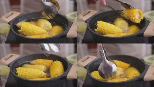 将水果玉米放入砂锅煮熟特写高清在线视频素材下载