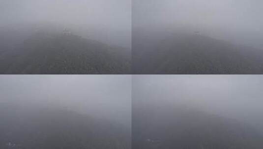 烟雨蒙蒙下充满梦幻的湖州莫干山裸心堡航拍高清在线视频素材下载