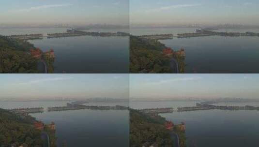 航拍武汉东湖磨山楚城门清晨湖面桥高清在线视频素材下载