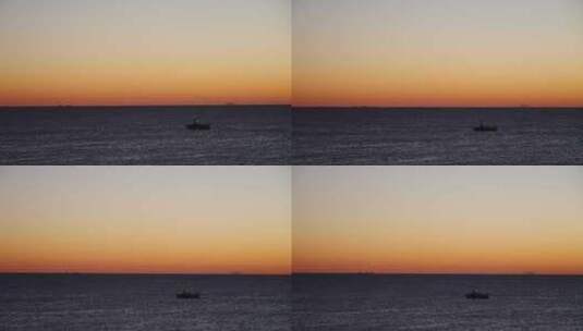 日出时的海上小船高清在线视频素材下载