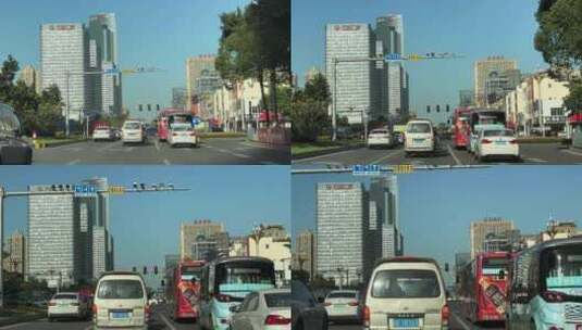 开车行驶在深圳道路车流交通城市车窗外风景高清在线视频素材下载