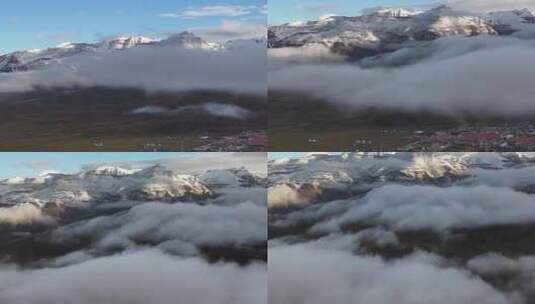 航拍西藏塔尔钦冈仁波齐雪山晨雾高清在线视频素材下载