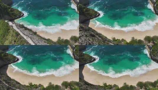印尼努沙佩尼达岛精灵坠崖沙滩和绿松石大海高清在线视频素材下载