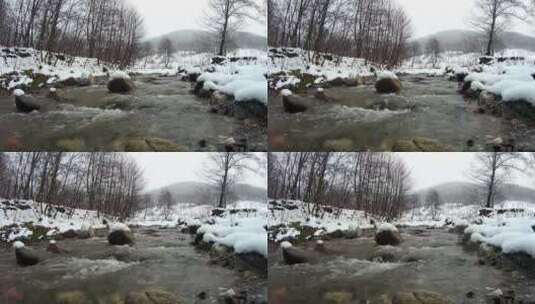 落满雪花的小溪留着清澈的溪水高清在线视频素材下载