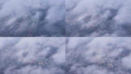 城市高空航拍云雾缭绕清早晨街道楼房大景高清在线视频素材下载