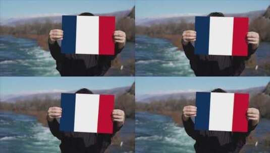 手持法国国旗旗帜的人高清在线视频素材下载