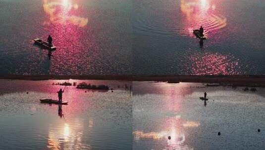 金色湖面上的渔夫划船落日余晖光影小船高清在线视频素材下载