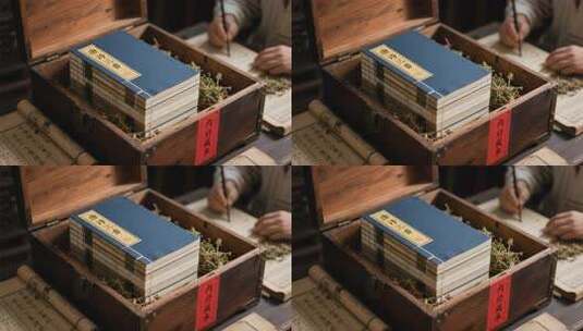 木箱内藏古代书籍与书写场景高清在线视频素材下载