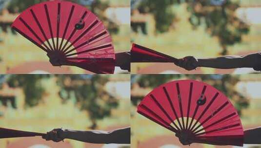 僧人在寺庙里练武 扇子特写高清在线视频素材下载