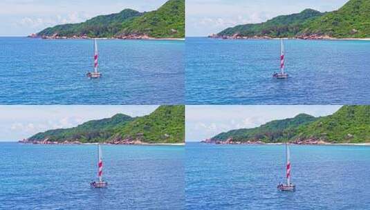 海南三亚海棠湾后海渔村航拍蔚蓝色海岸线高清在线视频素材下载