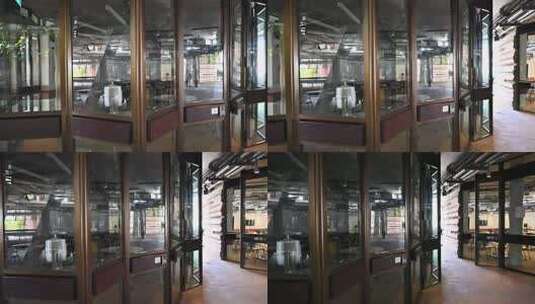 玻璃旋转门后的室内场景 NTU小笼包The Hive高清在线视频素材下载