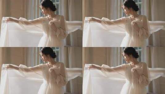 女子室内轻扬白色纱裙素材高清在线视频素材下载
