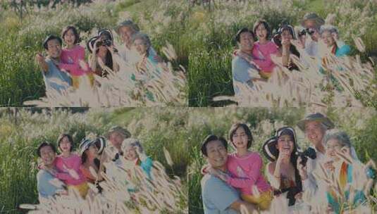 一家五口在湖边草丛中观鸟高清在线视频素材下载