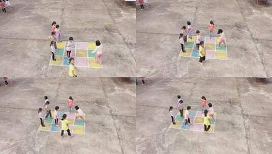 小孩在户外场地玩跳房子游戏高清在线视频素材下载