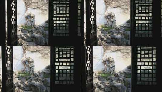 透过窗棂看苏州园林假山景致高清在线视频素材下载