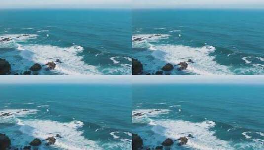 俯瞰海浪拍打礁石的海洋景观高清在线视频素材下载