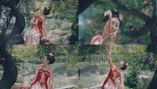 古装女子持扇坐于树下高清在线视频素材下载