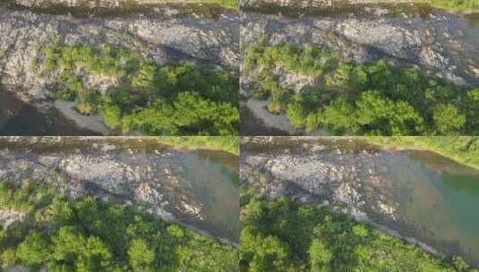 俯拍河中被风化的礁石高清在线视频素材下载