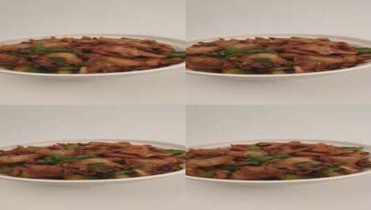 家常菜品墨鱼炒肉4k旋转展示高清在线视频素材下载
