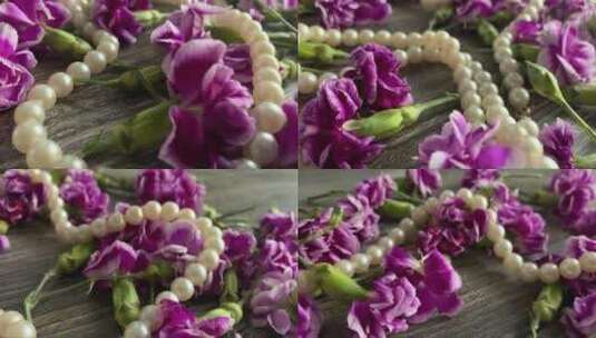 桌上有紫色和粉红色的康乃馨花蕾混合珍珠高清在线视频素材下载