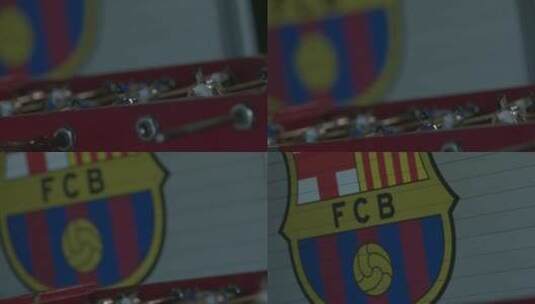 西班牙巴塞罗那队队徽与桌面足球高清在线视频素材下载