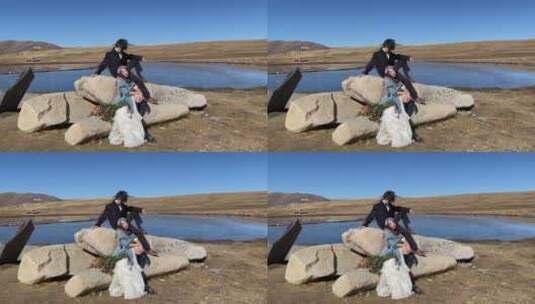 高原枯黄草原湖泊拍写真婚纱的副本高清在线视频素材下载