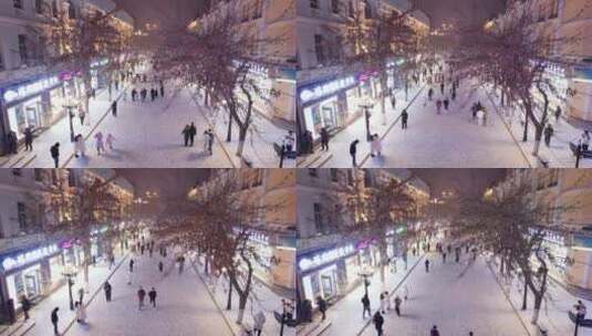 哈尔滨中央大街夜晚雪景航拍高清在线视频素材下载