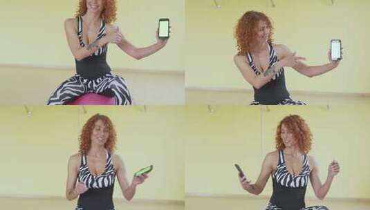 健身教练在展示她的手机高清在线视频素材下载