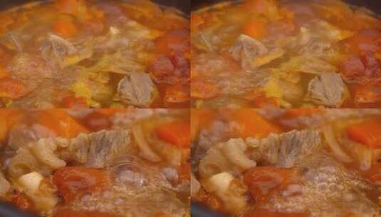 番茄炖牛腩牛肉西红柿炖煮热气腾腾高清在线视频素材下载