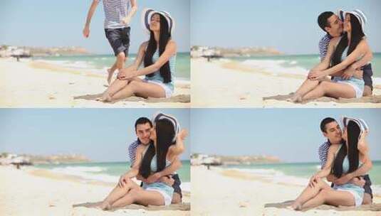 幸福的年轻夫妇在沙滩上拥抱高清在线视频素材下载