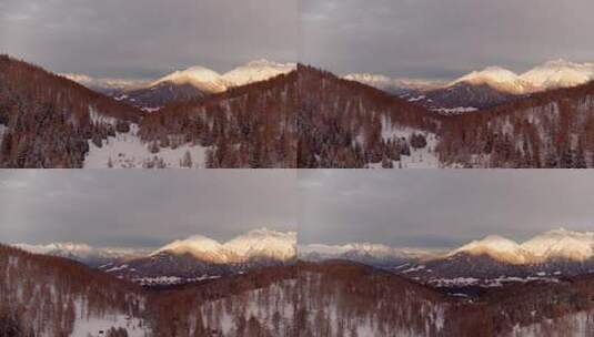 航拍秋天森林雪山雪原雪景冬季原始森林高清在线视频素材下载